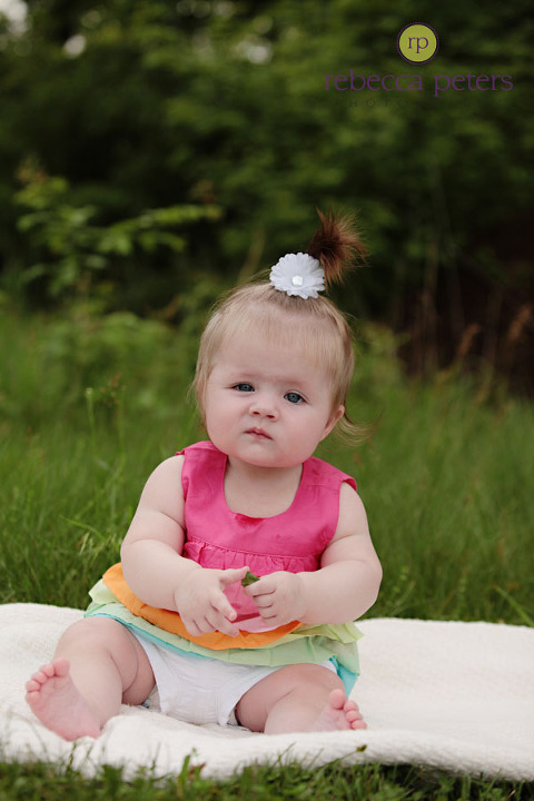 She is just learning to sit on her own, so I love her little "lean" in this image!